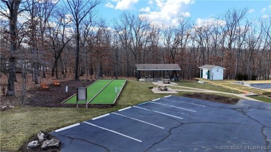 Looking to enjoy all the Lake of the Ozarks has to offer? Then on The Club At Porto Cima in Missouri - for sale on GolfHomes.com, golf home, golf lot