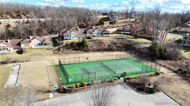 Looking to enjoy all the Lake of the Ozarks has to offer? Then on The Club At Porto Cima in Missouri - for sale on GolfHomes.com, golf home, golf lot