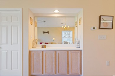 Introducing this fully furnished, top floor, end unit 2-bedroom on River Oaks Golf Plantation  in South Carolina - for sale on GolfHomes.com, golf home, golf lot