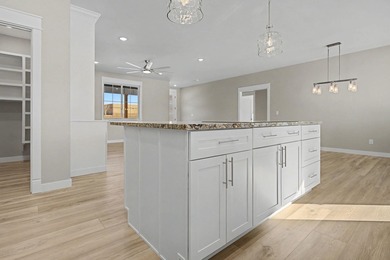 This newly built home in Cedaredge sits just to the north of Tee on Cedaredge Golf Course in Colorado - for sale on GolfHomes.com, golf home, golf lot