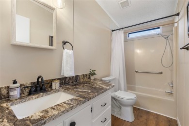 Welcome to 8517 Buckingham Place, a beautifully updated home in on Imperial Lakewoods Golf Club in Florida - for sale on GolfHomes.com, golf home, golf lot