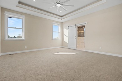 This newly built home in Cedaredge sits just to the north of Tee on Cedaredge Golf Course in Colorado - for sale on GolfHomes.com, golf home, golf lot