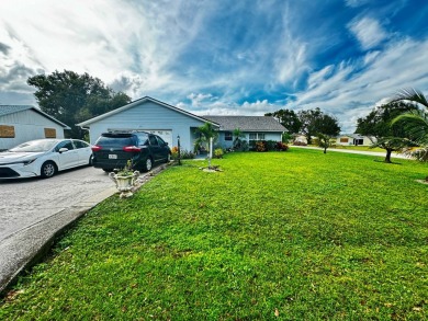 EXCEPTIONALLY... WELL MAINTAINED HOME ON LARGE CORNER LOT IN THE on Sun n Lake Golf and Country Club in Florida - for sale on GolfHomes.com, golf home, golf lot