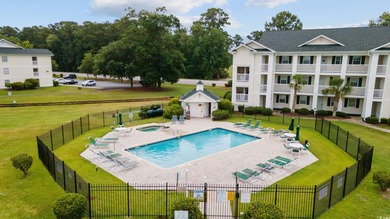 Introducing this fully furnished, top floor, end unit 2-bedroom on River Oaks Golf Plantation  in South Carolina - for sale on GolfHomes.com, golf home, golf lot