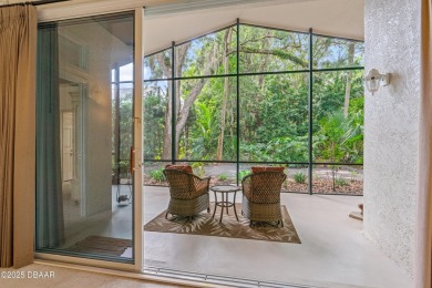 You are greeted by a lovely well maintained Front Garden. The on Halifax Plantation Golf Club in Florida - for sale on GolfHomes.com, golf home, golf lot