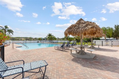 Welcome to 8517 Buckingham Place, a beautifully updated home in on Imperial Lakewoods Golf Club in Florida - for sale on GolfHomes.com, golf home, golf lot