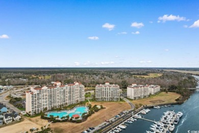 Experience breathtaking waterfront views from this stunning on Barefoot Resort and Golf Club  in South Carolina - for sale on GolfHomes.com, golf home, golf lot