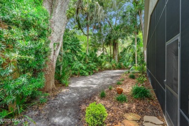 You are greeted by a lovely well maintained Front Garden. The on Halifax Plantation Golf Club in Florida - for sale on GolfHomes.com, golf home, golf lot