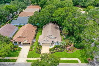 You are greeted by a lovely well maintained Front Garden. The on Halifax Plantation Golf Club in Florida - for sale on GolfHomes.com, golf home, golf lot