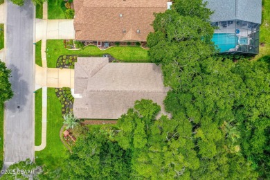 You are greeted by a lovely well maintained Front Garden. The on Halifax Plantation Golf Club in Florida - for sale on GolfHomes.com, golf home, golf lot