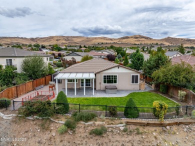 Experience golf course living at its finest. Nestled on a on  in Nevada - for sale on GolfHomes.com, golf home, golf lot