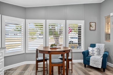 Welcome to this charming 2-bedroom, 2-bathroom home with 1,296 on Brookridge Country Club in Florida - for sale on GolfHomes.com, golf home, golf lot