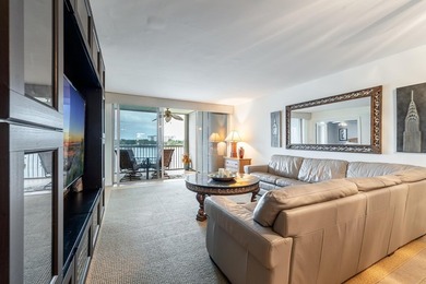 EXPERIENCE EPIC VIEWS from this Gorgeous Updated Lakefront Condo on Palm-Aire Country Club and Resort - Palms in Florida - for sale on GolfHomes.com, golf home, golf lot