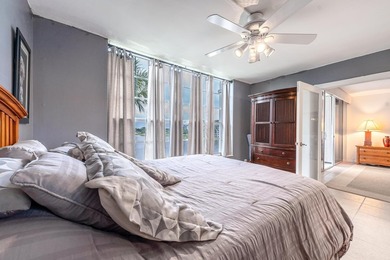 EXPERIENCE EPIC VIEWS from this Gorgeous Updated Lakefront Condo on Palm-Aire Country Club and Resort - Palms in Florida - for sale on GolfHomes.com, golf home, golf lot