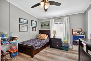 Welcome to this charming 2-bedroom, 2-bathroom home with 1,296 on Brookridge Country Club in Florida - for sale on GolfHomes.com, golf home, golf lot