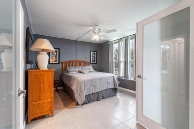 EXPERIENCE EPIC VIEWS from this Gorgeous Updated Lakefront Condo on Palm-Aire Country Club and Resort - Palms in Florida - for sale on GolfHomes.com, golf home, golf lot