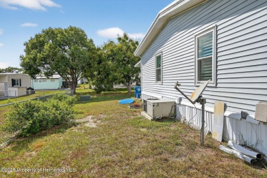 Welcome to this charming 2-bedroom, 2-bathroom home with 1,296 on Brookridge Country Club in Florida - for sale on GolfHomes.com, golf home, golf lot