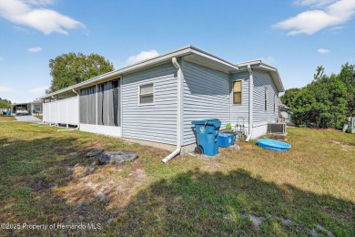 Welcome to this charming 2-bedroom, 2-bathroom home with 1,296 on Brookridge Country Club in Florida - for sale on GolfHomes.com, golf home, golf lot