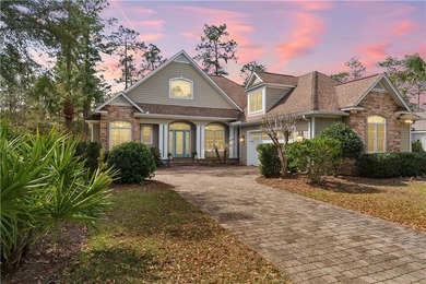 Beautiful custom-designed coastal retreat located in the highly on The Golf Club At Sanctuary Cove in Georgia - for sale on GolfHomes.com, golf home, golf lot