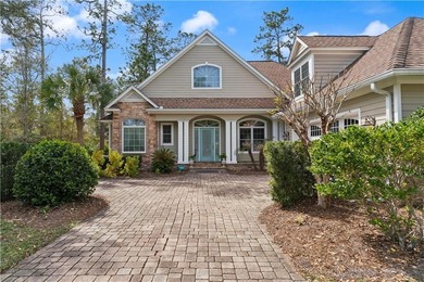 Beautiful custom-designed coastal retreat located in the highly on The Golf Club At Sanctuary Cove in Georgia - for sale on GolfHomes.com, golf home, golf lot
