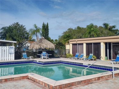 Great opportunity to own a beautifully maintained 2BR/2BA villa on Mainlands Golf Club in Florida - for sale on GolfHomes.com, golf home, golf lot