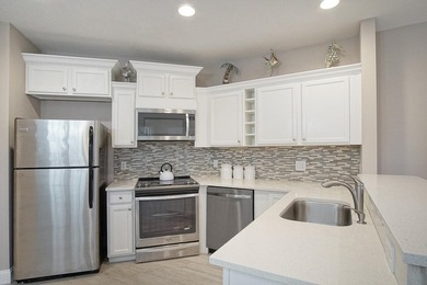 Golf course views, a waterfront lot, and two seperate units all on The Legacy Golf and Tennis Club in Florida - for sale on GolfHomes.com, golf home, golf lot