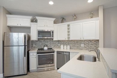 Golf course views, a waterfront lot, and two seperate units all on The Legacy Golf and Tennis Club in Florida - for sale on GolfHomes.com, golf home, golf lot