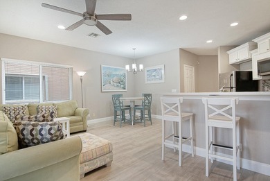 Golf course views, a waterfront lot, and two seperate units all on The Legacy Golf and Tennis Club in Florida - for sale on GolfHomes.com, golf home, golf lot