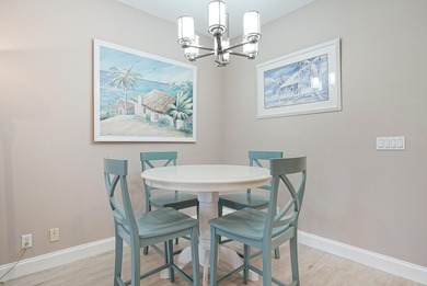 Golf course views, a waterfront lot, and two seperate units all on The Legacy Golf and Tennis Club in Florida - for sale on GolfHomes.com, golf home, golf lot