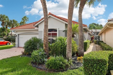 Step into luxury with this updated 3/2.5 gem located in the on Boca Lago Golf and Country Club in Florida - for sale on GolfHomes.com, golf home, golf lot