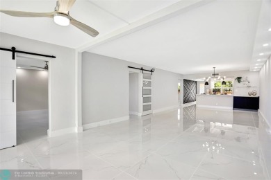 REDUCED* Introducing an exquisite 2-bed 2-bath luxury residence on Wynmoor Golf Course in Florida - for sale on GolfHomes.com, golf home, golf lot
