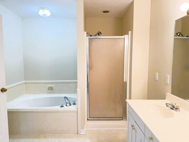 Enjoy the perfect sunset from the massive  picture windows on Pine Creek Golf Club in Mississippi - for sale on GolfHomes.com, golf home, golf lot