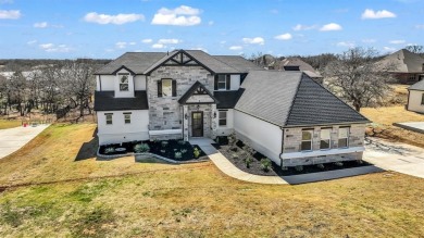This beautiful two-story home, built in 2021, is located in the on Sugar Tree Golf and Country Club in Texas - for sale on GolfHomes.com, golf home, golf lot