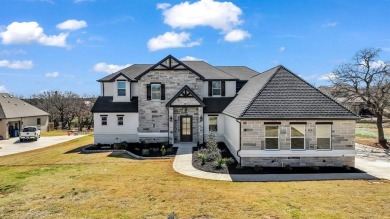 This beautiful two-story home, built in 2021, is located in the on Sugar Tree Golf and Country Club in Texas - for sale on GolfHomes.com, golf home, golf lot