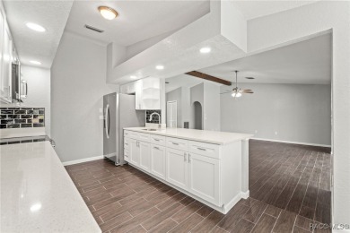 Welcome to your dream home on the golf course! This beautifully on Oak Hills Country Club in Florida - for sale on GolfHomes.com, golf home, golf lot