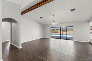 Welcome to your dream home on the golf course! This beautifully on Oak Hills Country Club in Florida - for sale on GolfHomes.com, golf home, golf lot