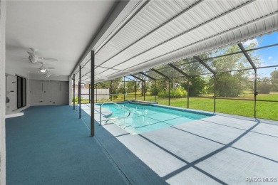 Welcome to your dream home on the golf course! This beautifully on Oak Hills Country Club in Florida - for sale on GolfHomes.com, golf home, golf lot