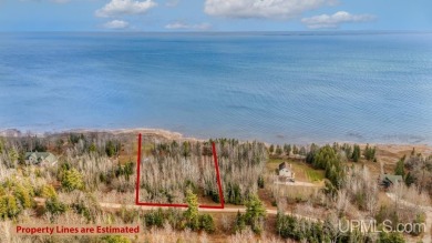 This 1.84-acre lot offers 237 feet of frontage on Lake on Nahma Club in Michigan - for sale on GolfHomes.com, golf home, golf lot