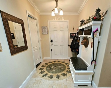 This meticulously cared-for home is as beautiful inside as it is on Big Cypress Golf and Country Club in Florida - for sale on GolfHomes.com, golf home, golf lot