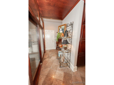 Step into the timeless elegance of this French Provincial on Wynlakes Golf and Country Club in Alabama - for sale on GolfHomes.com, golf home, golf lot