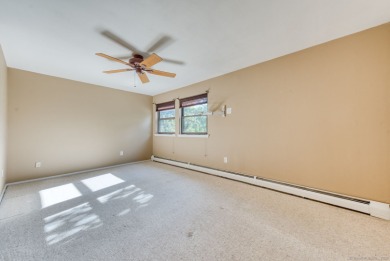 Move right into this beautifully maintained townhouse tucked on Rolling Greens Golf Club in Connecticut - for sale on GolfHomes.com, golf home, golf lot