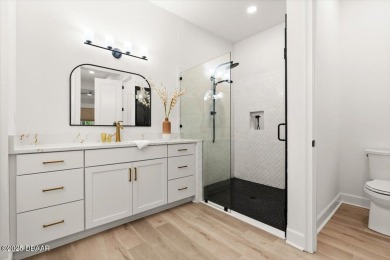 Custom Modern Luxury in Gated Plantation Bay! This 2023 on Plantation Bay Golf and Country Club in Florida - for sale on GolfHomes.com, golf home, golf lot