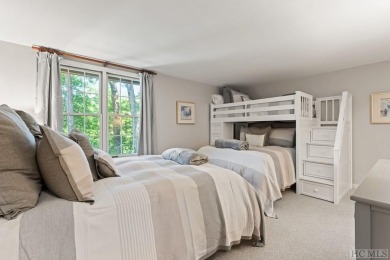 Partake in the mountain lifestyle with this 3 bedroom, 4.5 bath on Lake Toxaway Country Club in North Carolina - for sale on GolfHomes.com, golf home, golf lot