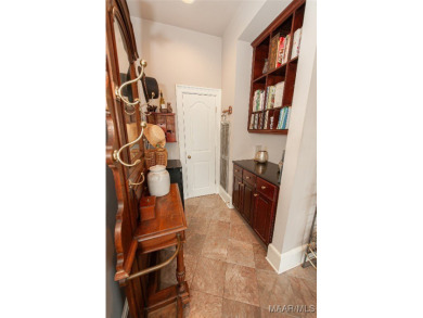 Step into the timeless elegance of this French Provincial on Wynlakes Golf and Country Club in Alabama - for sale on GolfHomes.com, golf home, golf lot