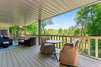 Partake in the mountain lifestyle with this 3 bedroom, 4.5 bath on Lake Toxaway Country Club in North Carolina - for sale on GolfHomes.com, golf home, golf lot