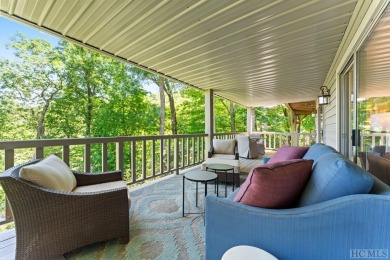 Partake in the mountain lifestyle with this 3 bedroom, 4.5 bath on Lake Toxaway Country Club in North Carolina - for sale on GolfHomes.com, golf home, golf lot