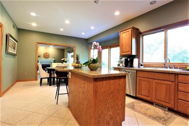 Located on the 14th fairway, this sprawling 4 bdrm home in on Stonebridge Golf Club in Michigan - for sale on GolfHomes.com, golf home, golf lot