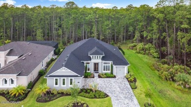 Custom Modern Luxury in Gated Plantation Bay! This 2023 on Plantation Bay Golf and Country Club in Florida - for sale on GolfHomes.com, golf home, golf lot