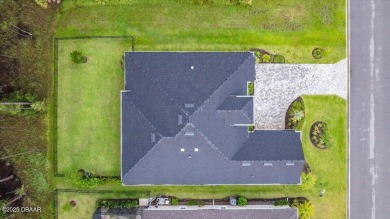 Custom Modern Luxury in Gated Plantation Bay! This 2023 on Plantation Bay Golf and Country Club in Florida - for sale on GolfHomes.com, golf home, golf lot