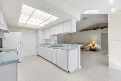 Welcome to this charming and well-maintained 2-bedroom, 2-bath on Oak Hills Country Club in Florida - for sale on GolfHomes.com, golf home, golf lot